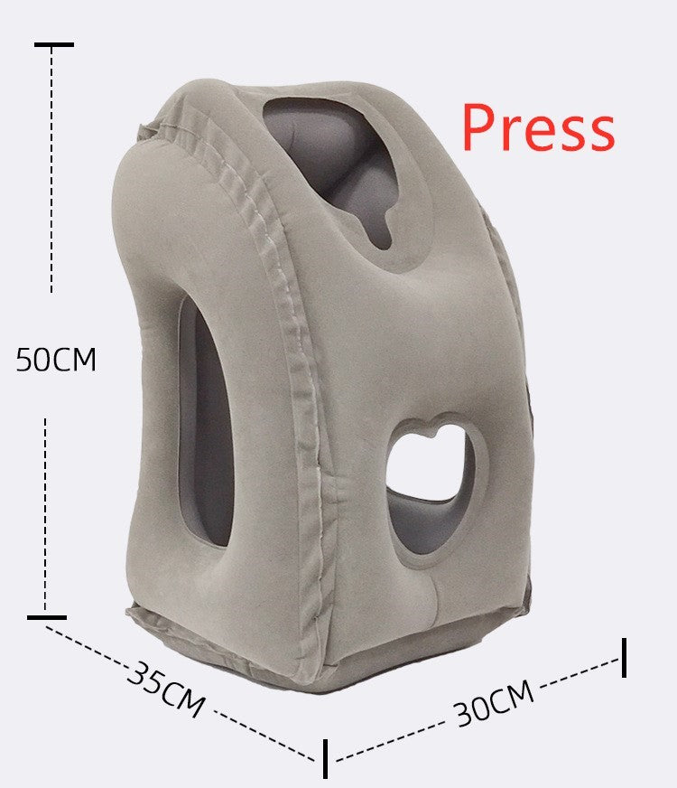 A grey inflatable cushion travel pillow, named "Inflatable Cushion Travel Pillow! For Neck, Chin, and Head Support," is shown with dimensions of 50 cm in height, 35 cm in width, and 30 cm in depth. The pillow is from the Aloha Relax brand and features multiple cut-out holes for stress relief along with the word "Press" highlighted in red.