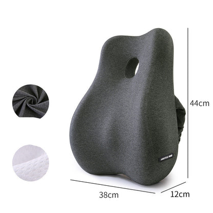 The Healthy Lumbar Support Cushion from Aloha Relax is an ergonomically designed grey seat cushion with lumbar support. It measures 44 cm in height, 38 cm in width, and 12 cm in depth. The cushion features a small central hole and includes close-up views of the fabric material for enhanced stress relief.