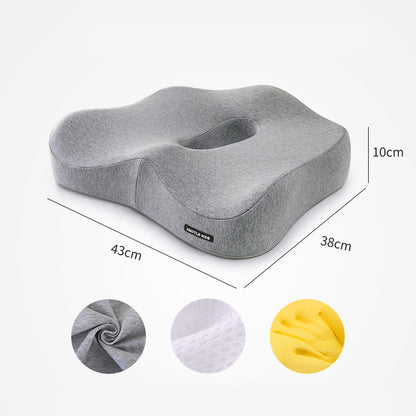 The Aloha Relax Healthy Lumbar Support Cushion is an ergonomic solution featuring a central cutout and measuring 43cm in width, 38cm in depth, and 10cm in height. Three circular insets highlight the cushion’s fabric texture available in gray, white, and yellow colors. It’s perfect for stress relief and sleep improvement.
