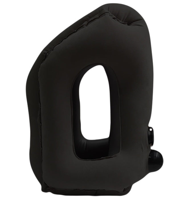 The Inflatable Cushion Travel Pillow by Aloha Relax is a black travel pillow featuring a large, rectangular central hole and a smaller side valve for easy inflation. It has a structured, upright design that provides excellent neck, chin, and head support, making it ideal for resting your head or arms. This pillow is perfect for improving sleep quality and relieving stress while on the go.