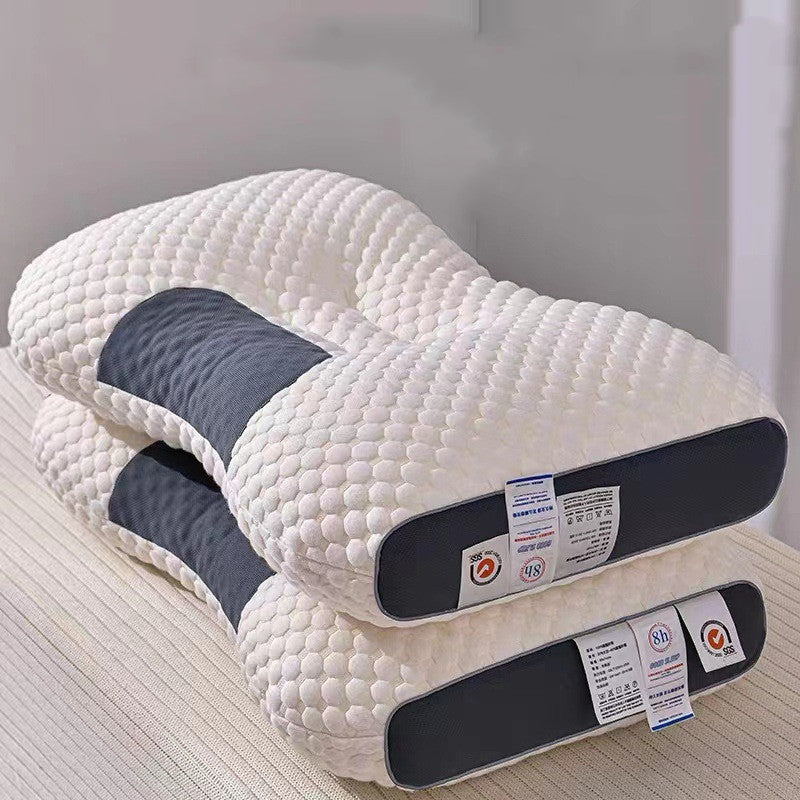 Two 3D Knitted Cotton Pillow Sleep Aids by Aloha Relax, featuring a wavy surface texture and dark gray side panels, are stacked on a light-colored surface. These white memory foam pillows, designed for sleep improvement, have multiple tags attached to one of the corners.