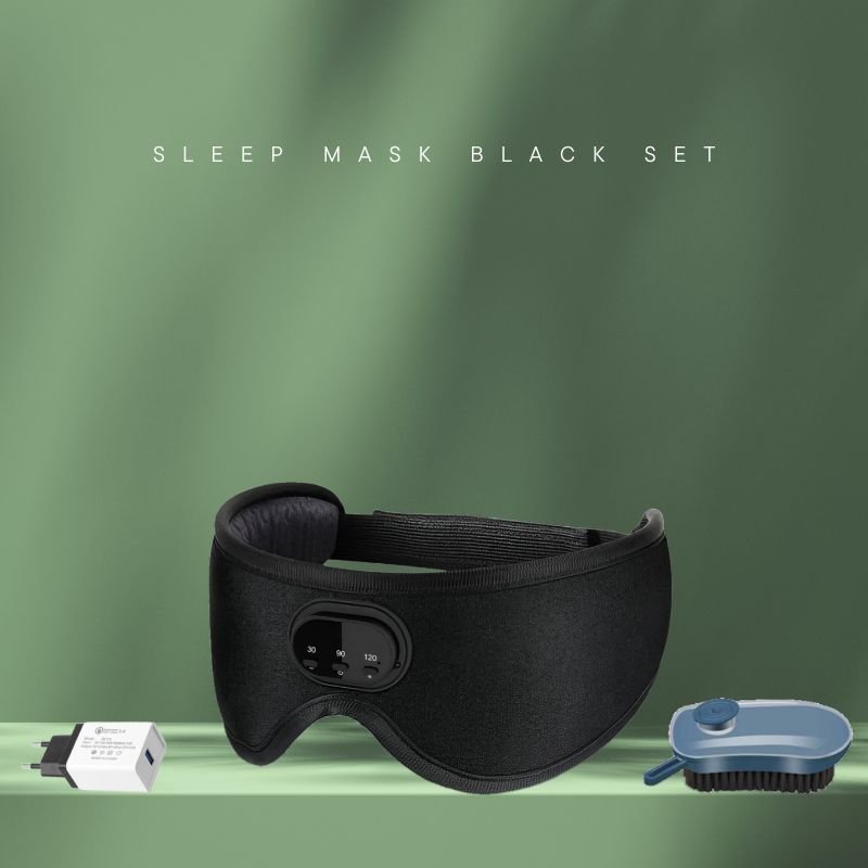 Aloha Relax's black 3D Bluetooth Sleep Mask, crafted from breathable material and featuring a control panel, is set against a green background. Power plug and small brush below complement the sleep mask aimed for insomnia relief. Top text: "SLEEP MASK BLACK SET.