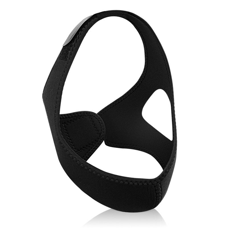 The Aloha Relax ANTI Snoring Chin Strap Adjustable is a black neoprene chin strap designed to support the jaw and enhance sleep improvement. It features a hole for the ears and an adjustable fastening to secure it around the head. The soft and flexible material ensures comfort and stress relief.