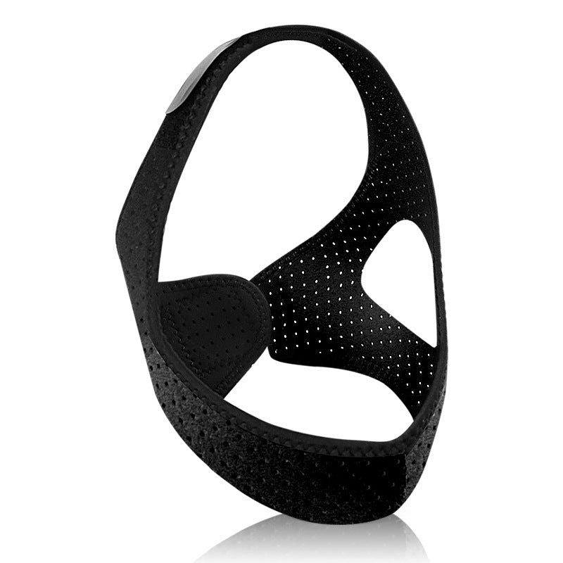 The Aloha Relax Adjustable Chin Strap reduces snoring with its breathable black perforated neoprene. Designed for ergonomic jaw support, it features a triangular hole pattern and adjustable fastening, ensuring both flexibility and comfort as a sleep aid.