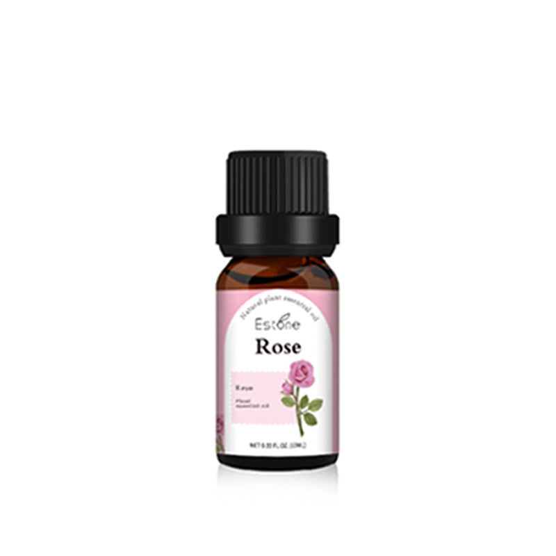 A small amber glass bottle with a black cap, labeled "Aloha Relax Rose." The label features a pink rose illustration and indicates it contains rose essential oil. Perfect for use with the Flame Aroma Diffuser Ultrasonic Cool Mist Maker by Aloha Relax, this 10 ml (0.33 fl oz) bottle infuses your space beautifully, harmonizing with the 7 colors of ambiance lighting seamlessly.